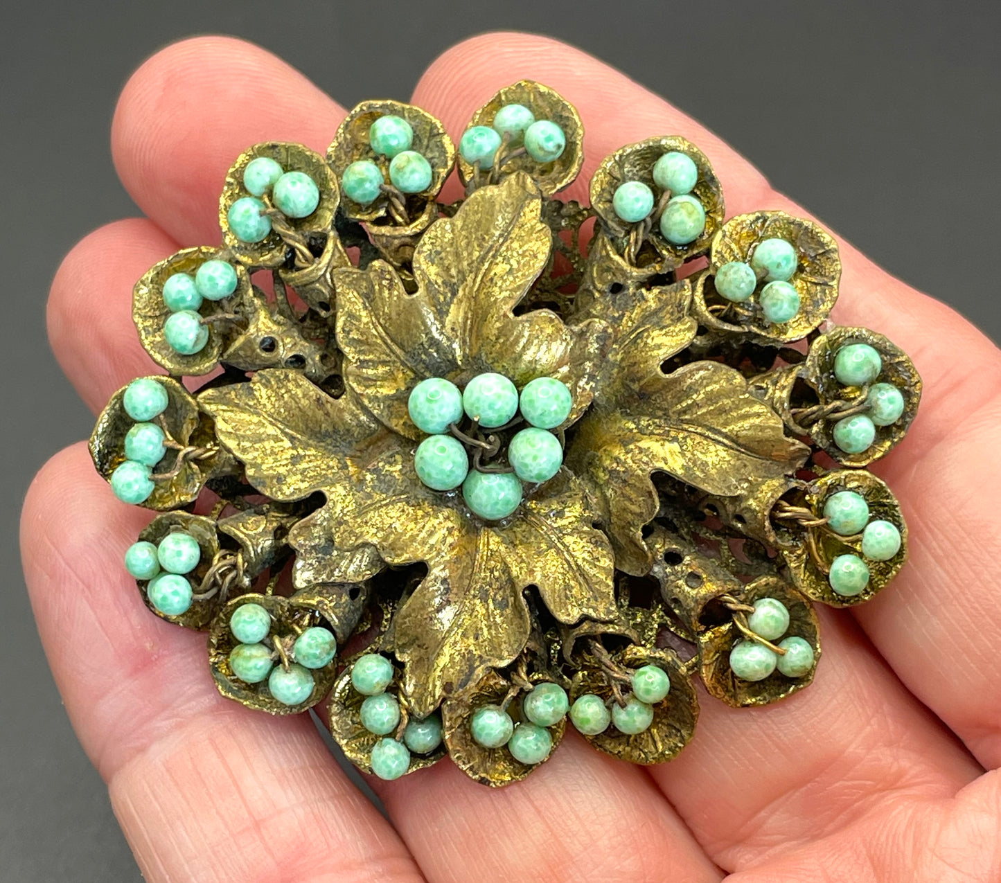 Large Neiger vintage brooch - green coloured glass wired beads and pretty gold tone leaf design, filigree back