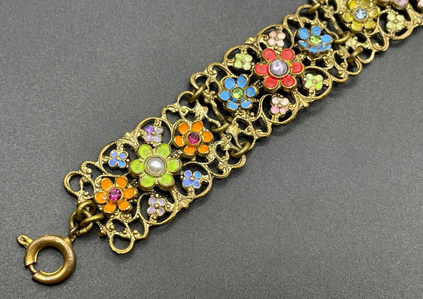 Vintage Art Deco Czech gold tone filigree, multicoloured glass rhinestone and cold painted enamel panel bracelet