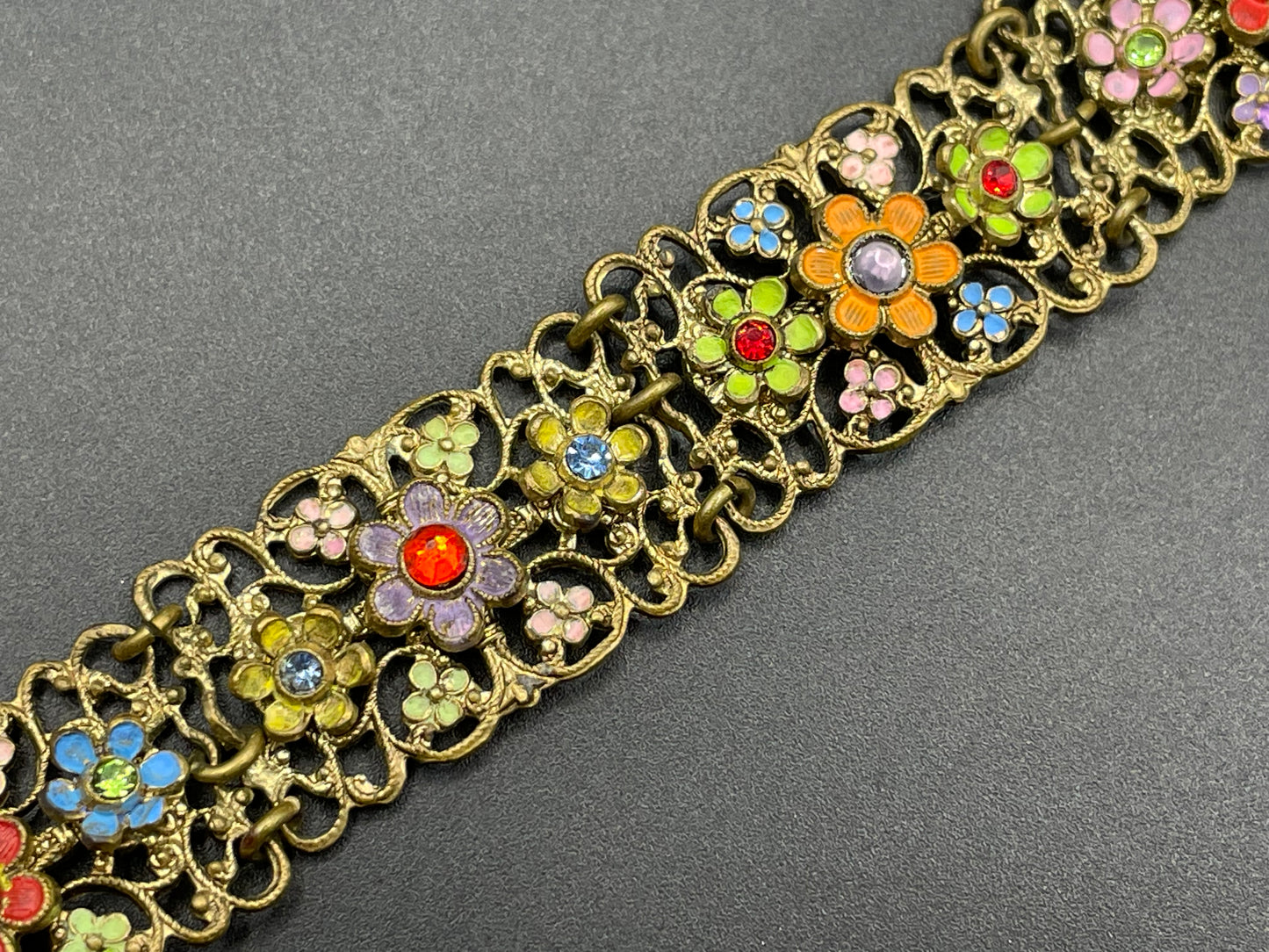 Vintage Art Deco Czech gold tone filigree, multicoloured glass rhinestone and cold painted enamel panel bracelet