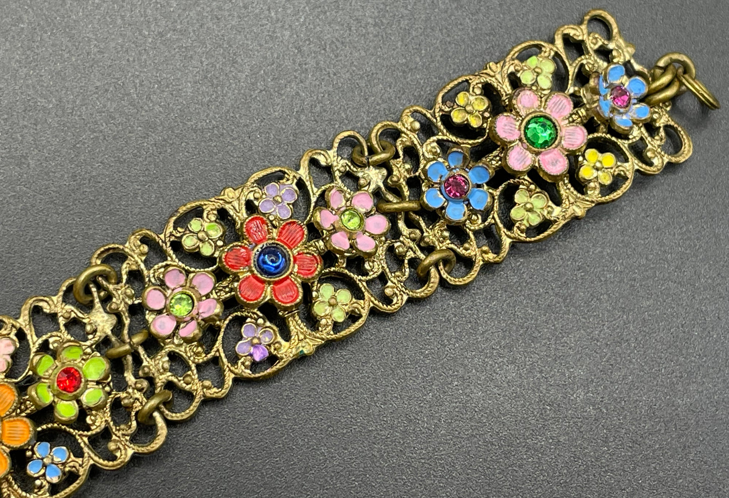 Vintage Art Deco Czech gold tone filigree, multicoloured glass rhinestone and cold painted enamel panel bracelet