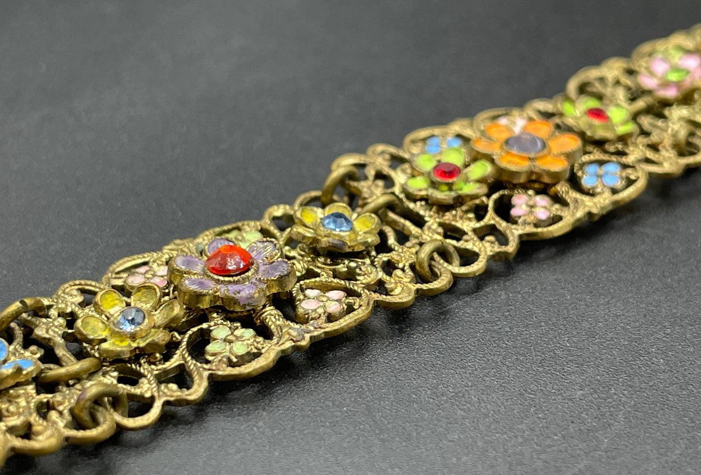 Vintage Art Deco Czech gold tone filigree, multicoloured glass rhinestone and cold painted enamel panel bracelet