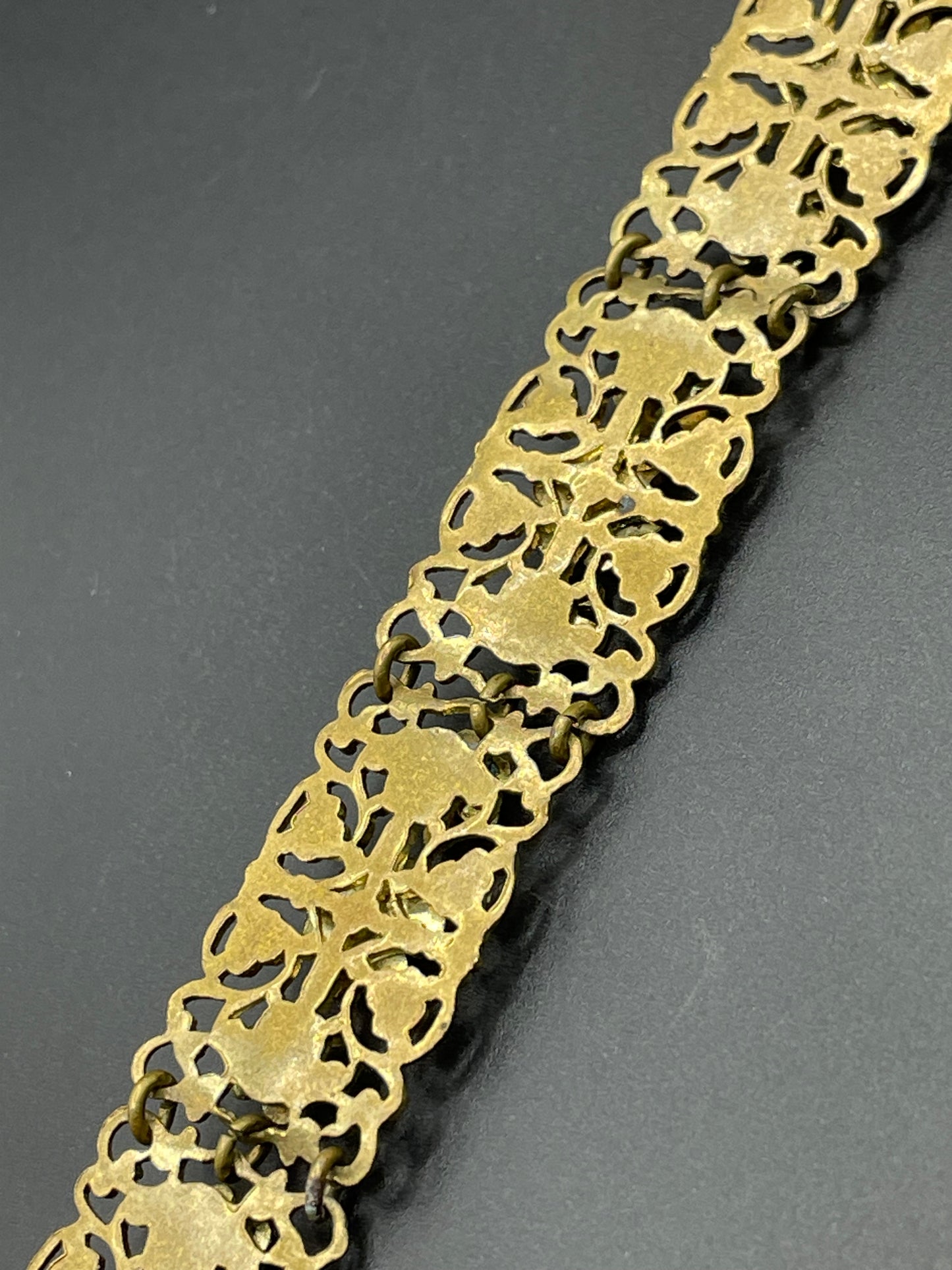 Vintage Art Deco Czech gold tone filigree, multicoloured glass rhinestone and cold painted enamel panel bracelet