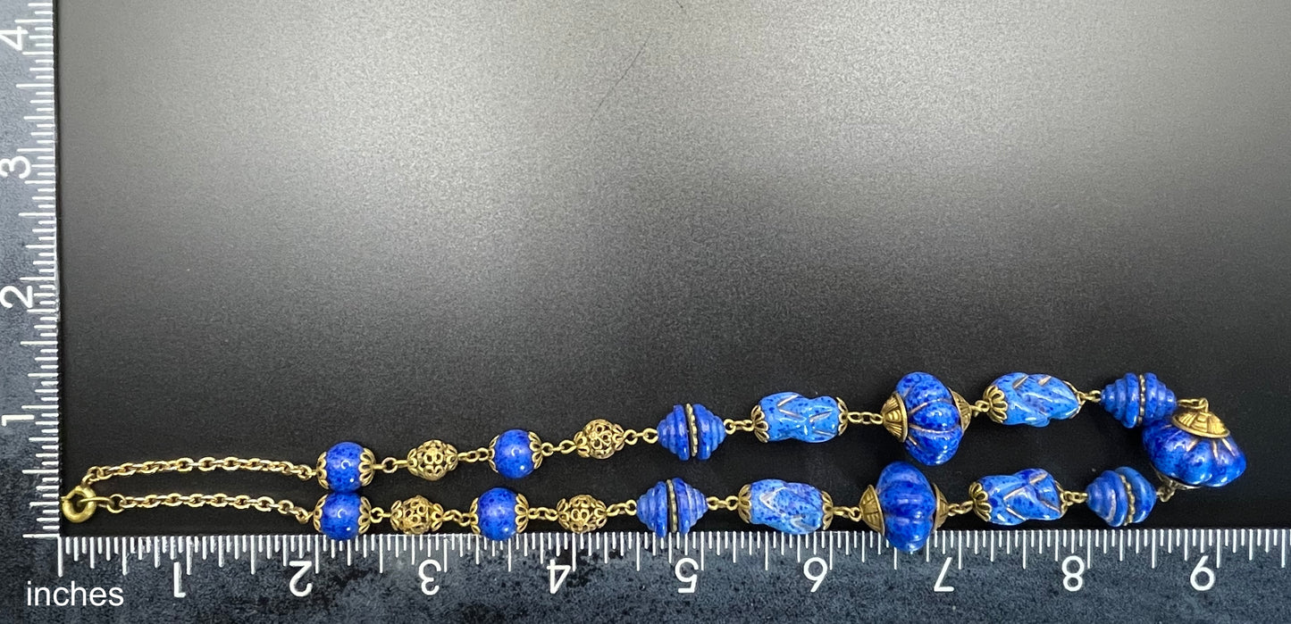 Vintage Art Deco Czech blue faux lapis lazuli glass bead necklace with beautiful moulded glass beads and gold tone filigree