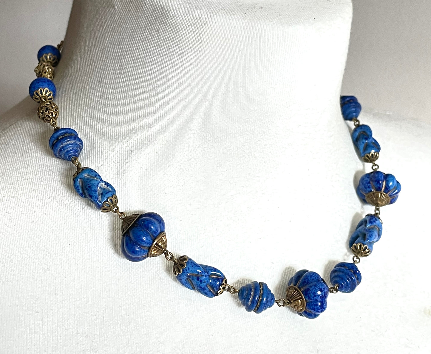 Vintage Art Deco Czech blue faux lapis lazuli glass bead necklace with beautiful moulded glass beads and gold tone filigree
