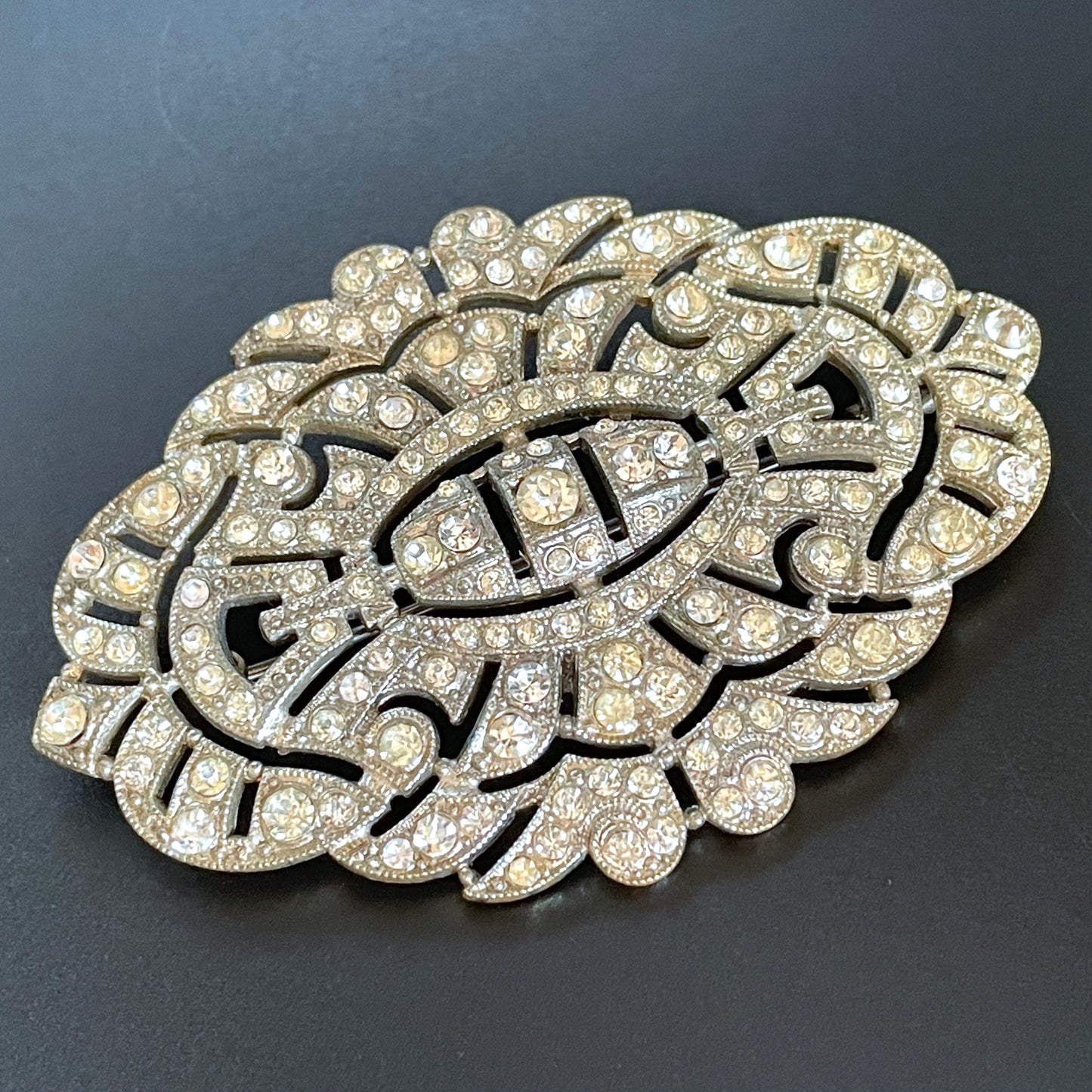 Huge vintage Art Deco paste brooch, with ice clear rhinestones and trombone clasp possibly French, large size