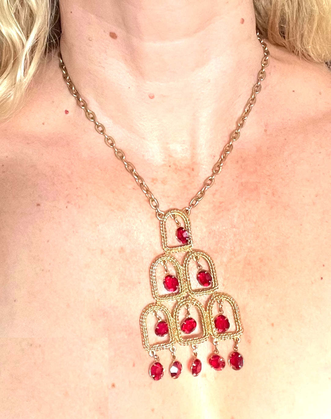 Vintage signed Lisner 1970s long gold tone and ruby red rhinestone chandelier pendant disco necklace and clip on earrings set