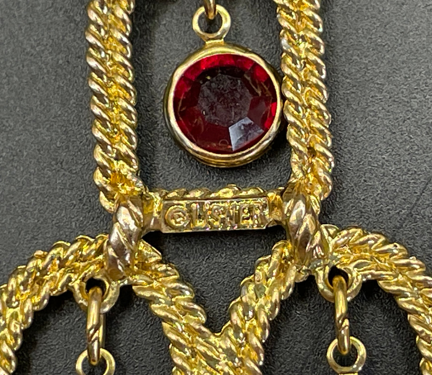 Vintage signed Lisner 1970s long gold tone and ruby red rhinestone chandelier pendant disco necklace and clip on earrings set