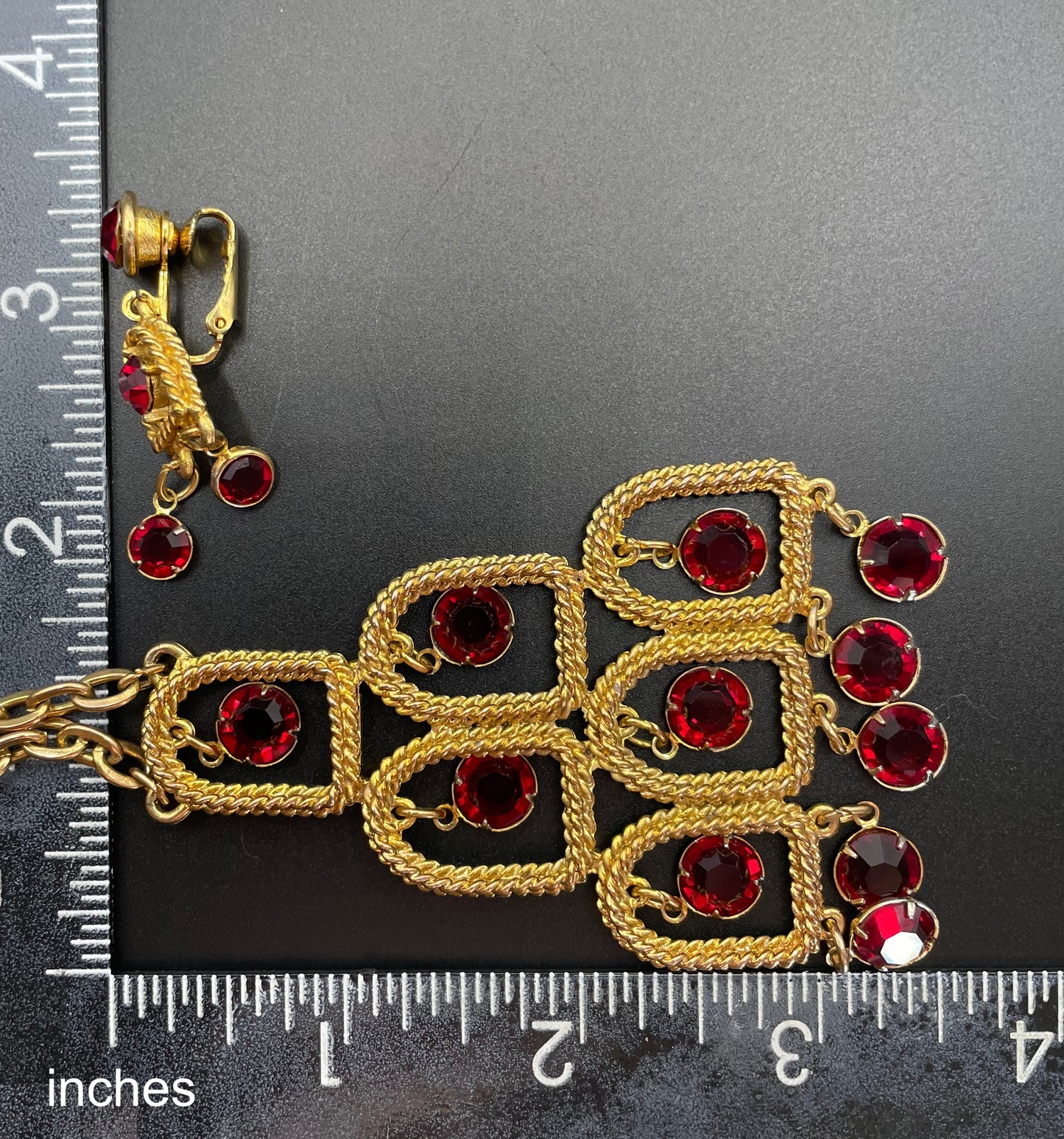 Vintage signed Lisner 1970s long gold tone and ruby red rhinestone chandelier pendant disco necklace and clip on earrings set