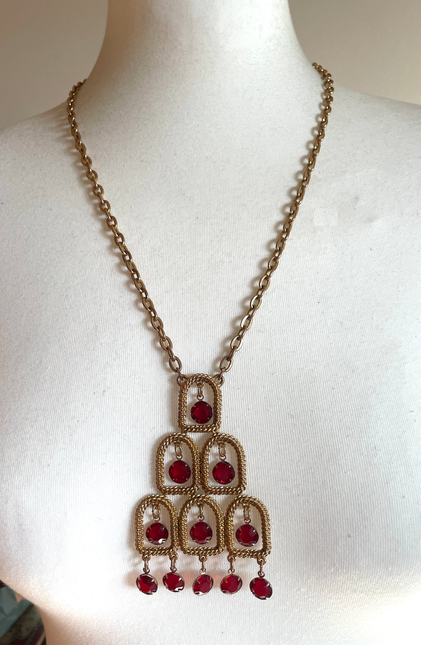 Vintage signed Lisner 1970s long gold tone and ruby red rhinestone chandelier pendant disco necklace and clip on earrings set