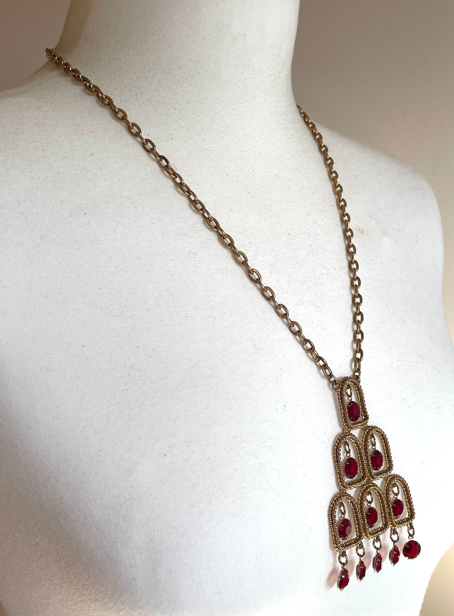 Vintage signed Lisner 1970s long gold tone and ruby red rhinestone chandelier pendant disco necklace and clip on earrings set