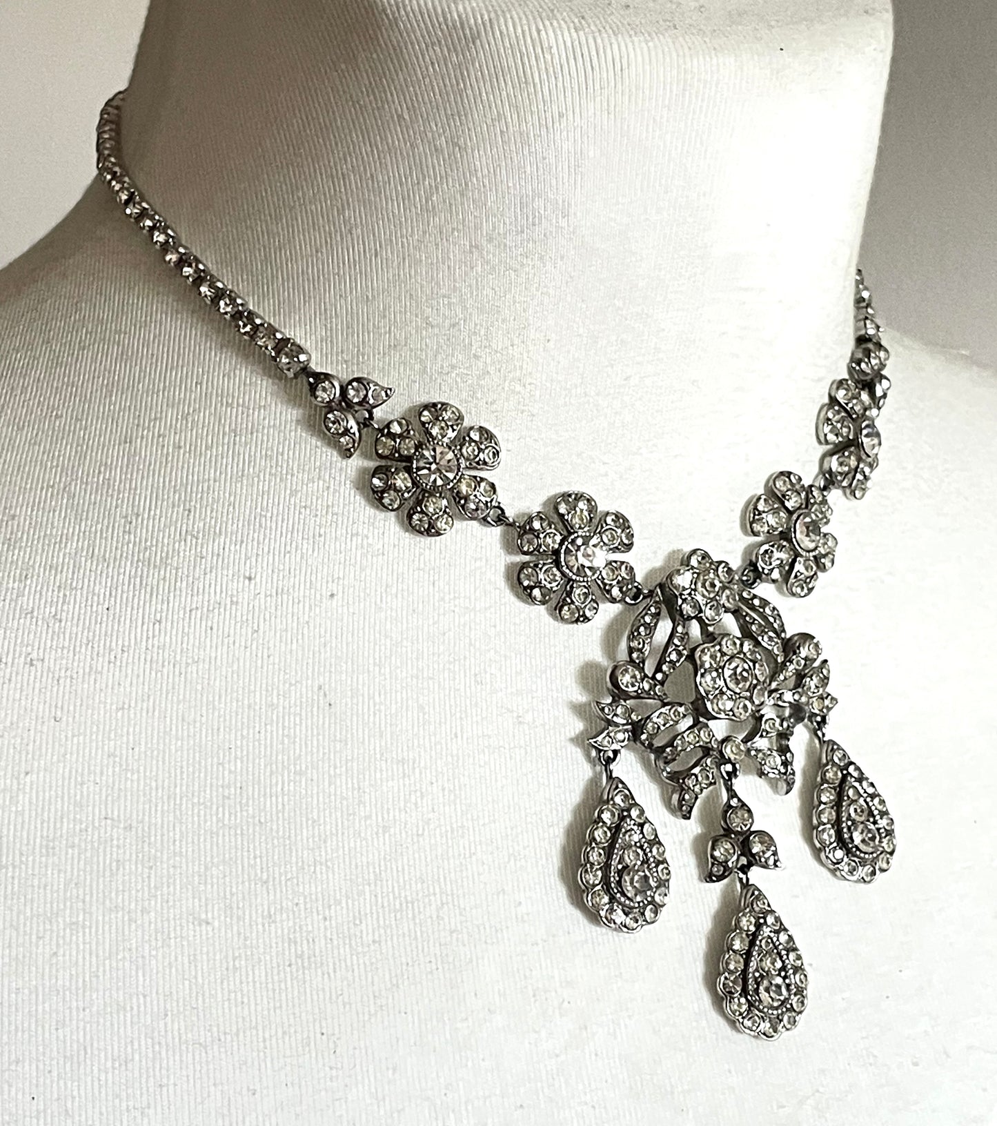 Vintage unsigned Attwood & Sawyer baroque style, ornate rhinestone necklace and matching clip on earrings, encrusted with clear rhinestones
