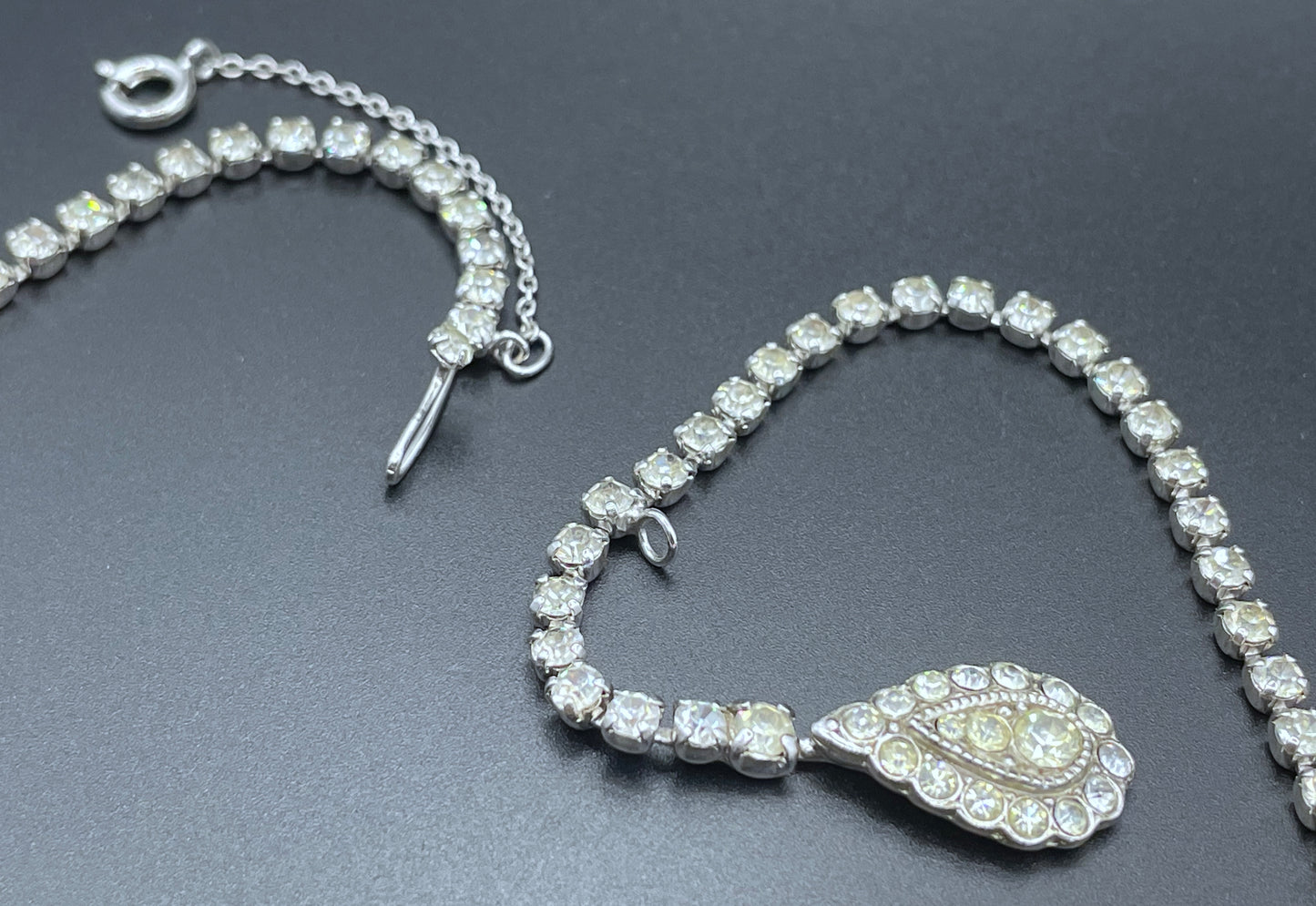 Vintage unsigned Attwood & Sawyer baroque style, ornate rhinestone necklace and matching clip on earrings, encrusted with clear rhinestones