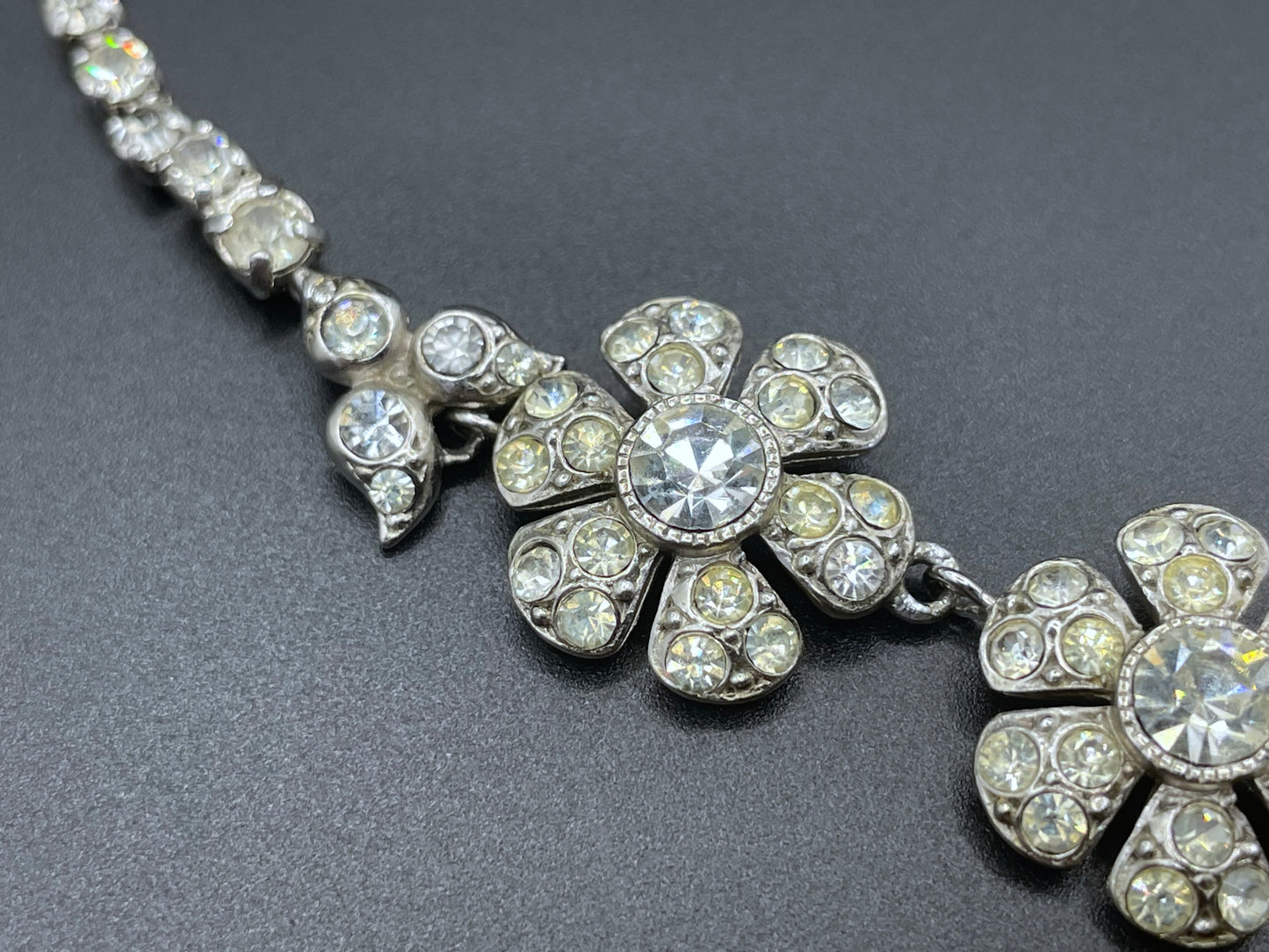 Vintage unsigned Attwood & Sawyer baroque style, ornate rhinestone necklace and matching clip on earrings, encrusted with clear rhinestones
