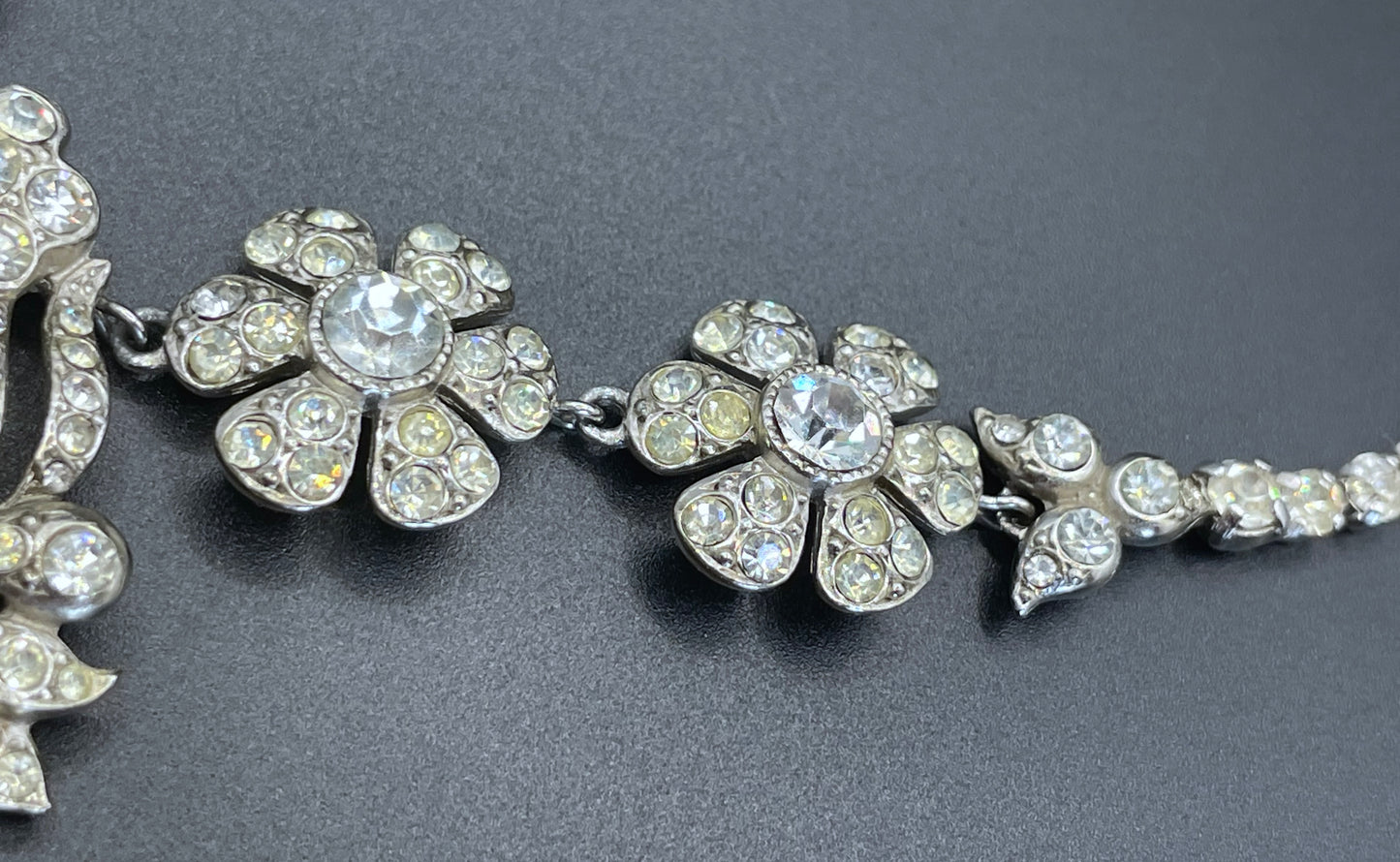 Vintage unsigned Attwood & Sawyer baroque style, ornate rhinestone necklace and matching clip on earrings, encrusted with clear rhinestones