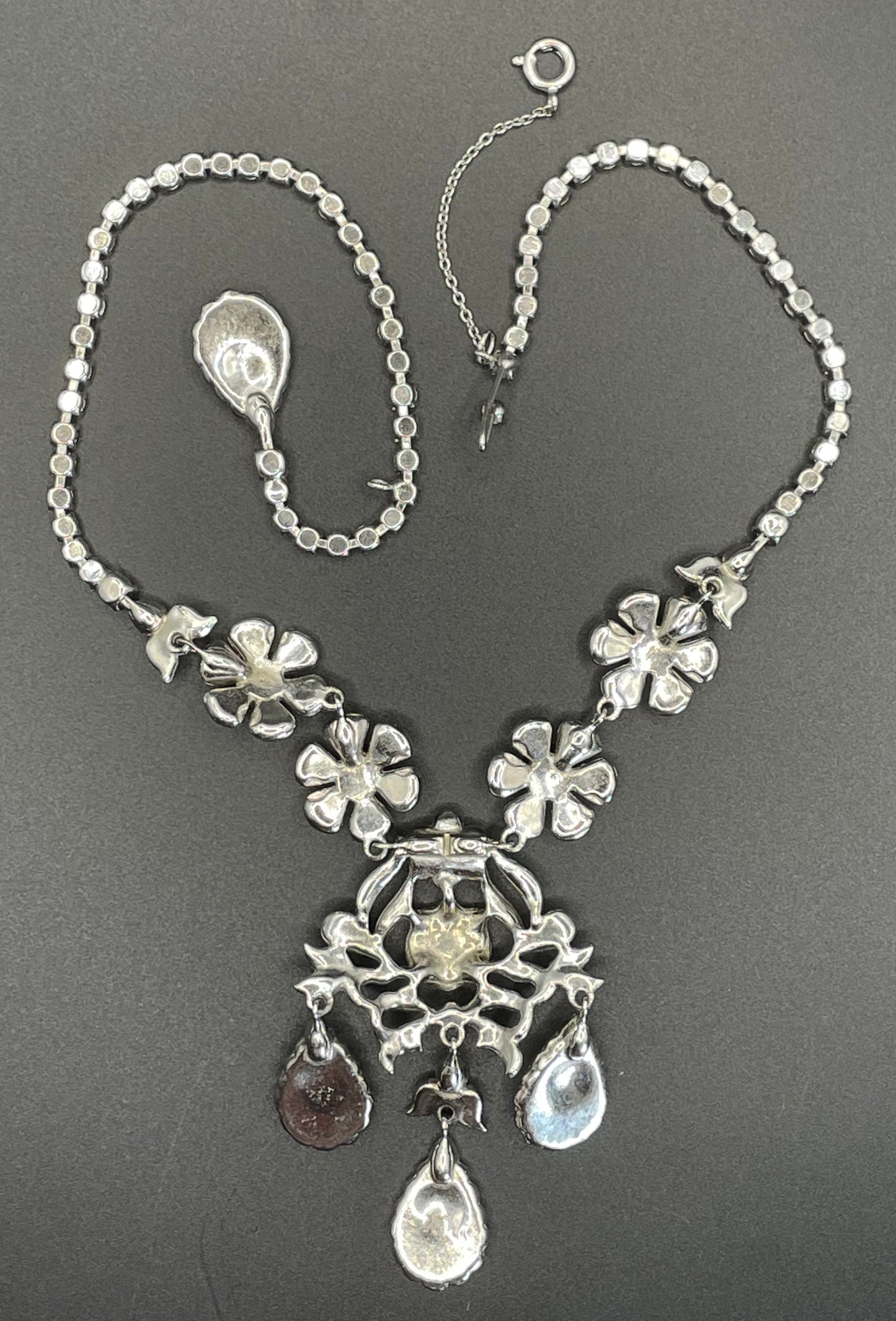 Vintage unsigned Attwood & Sawyer baroque style, ornate rhinestone necklace and matching clip on earrings, encrusted with clear rhinestones
