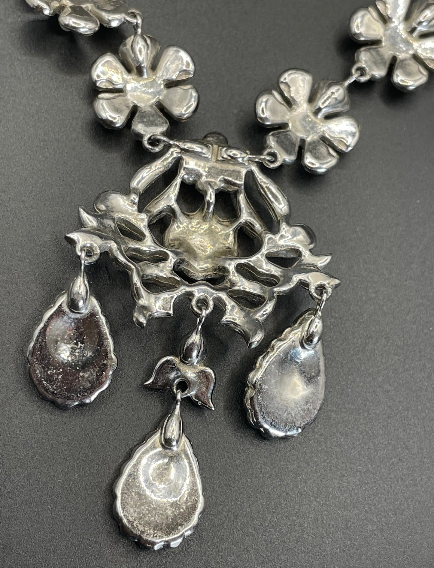 Vintage unsigned Attwood & Sawyer baroque style, ornate rhinestone necklace and matching clip on earrings, encrusted with clear rhinestones