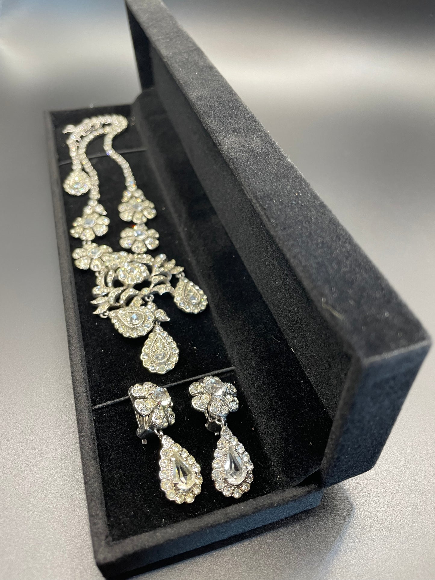 Vintage unsigned Attwood & Sawyer baroque style, ornate rhinestone necklace and matching clip on earrings, encrusted with clear rhinestones