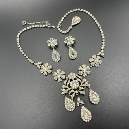 Vintage unsigned Attwood & Sawyer baroque style, ornate rhinestone necklace and matching clip on earrings, encrusted with clear rhinestones