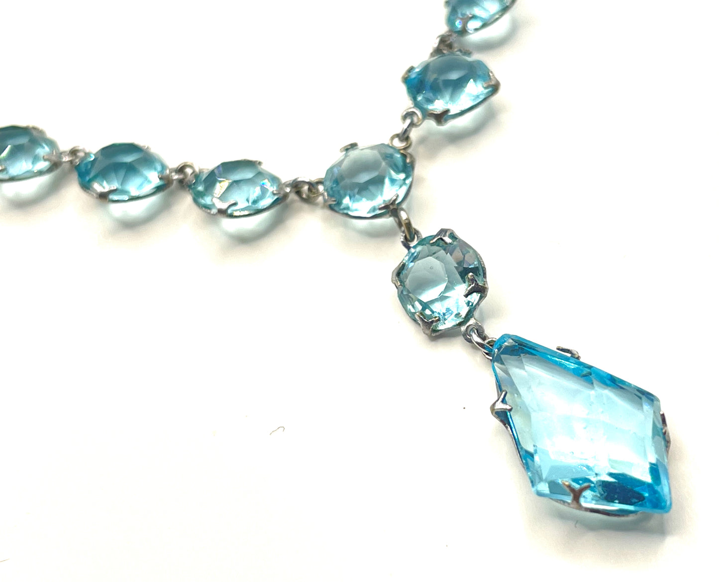Vintage Art Deco light sapphire blue paste riviere necklace with crystal drop, bezel set open backed stones set in silver tone