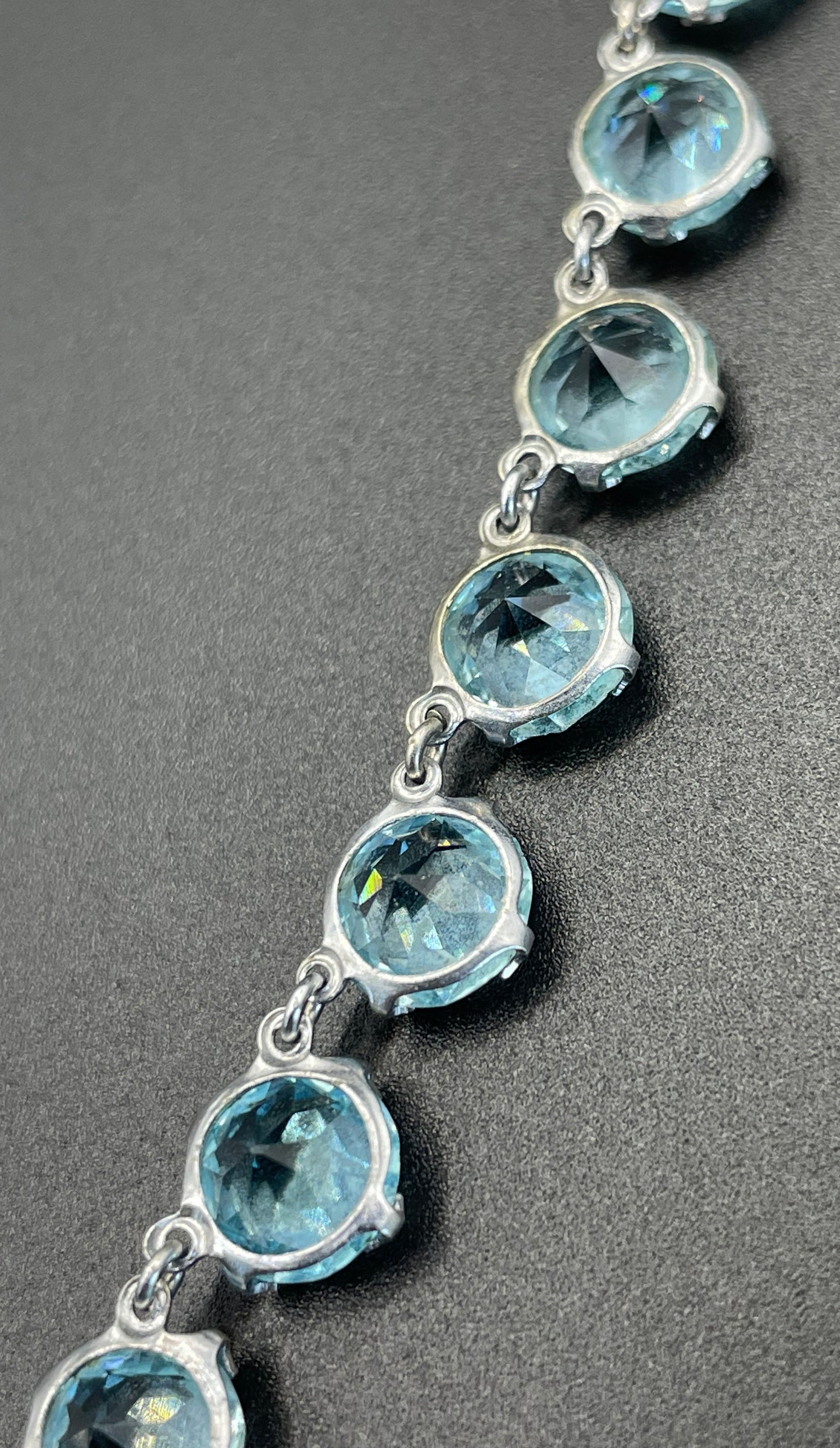 Vintage Art Deco light sapphire blue paste riviere necklace with crystal drop, bezel set open backed stones set in silver tone