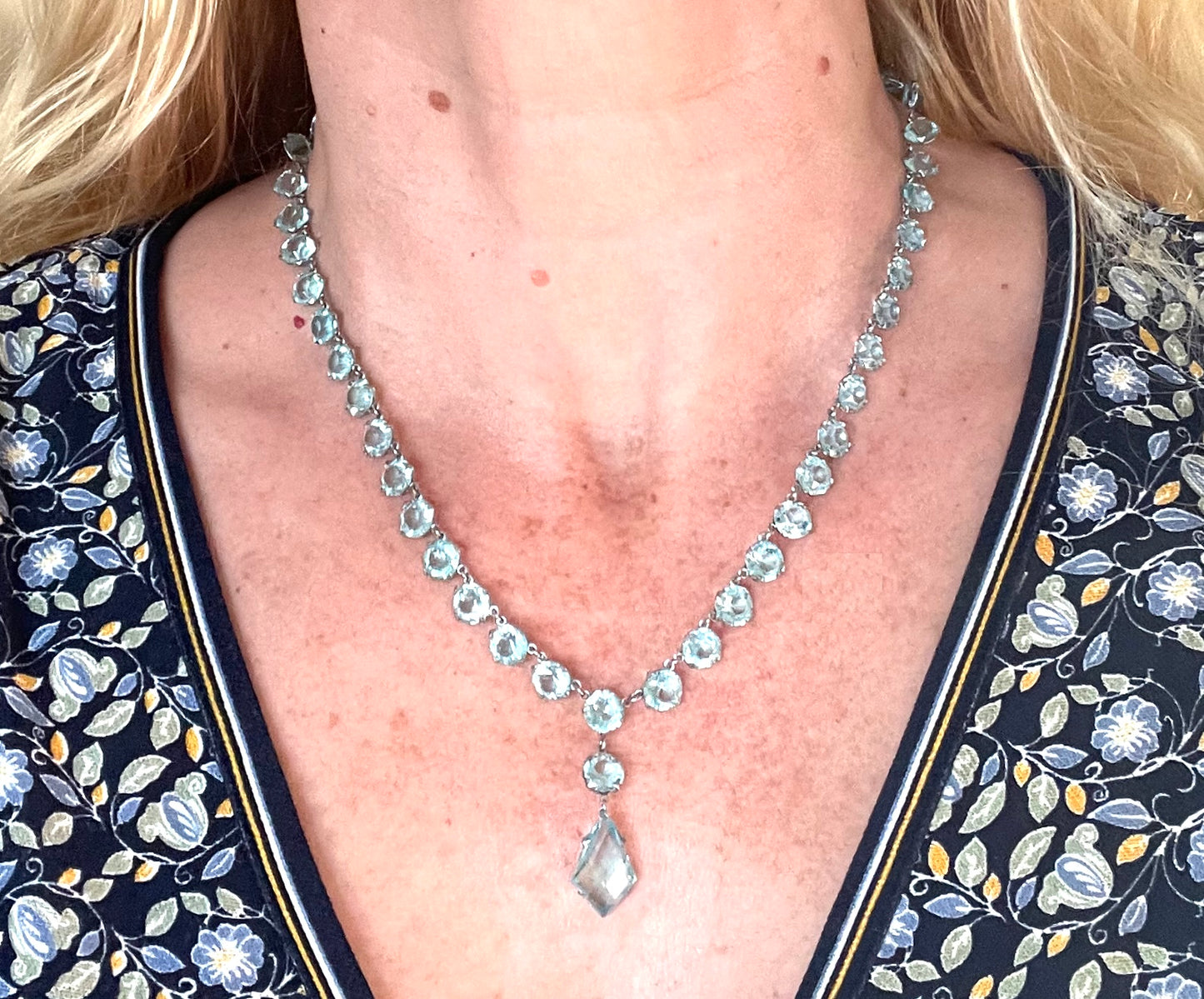 Vintage Art Deco light sapphire blue paste riviere necklace with crystal drop, bezel set open backed stones set in silver tone