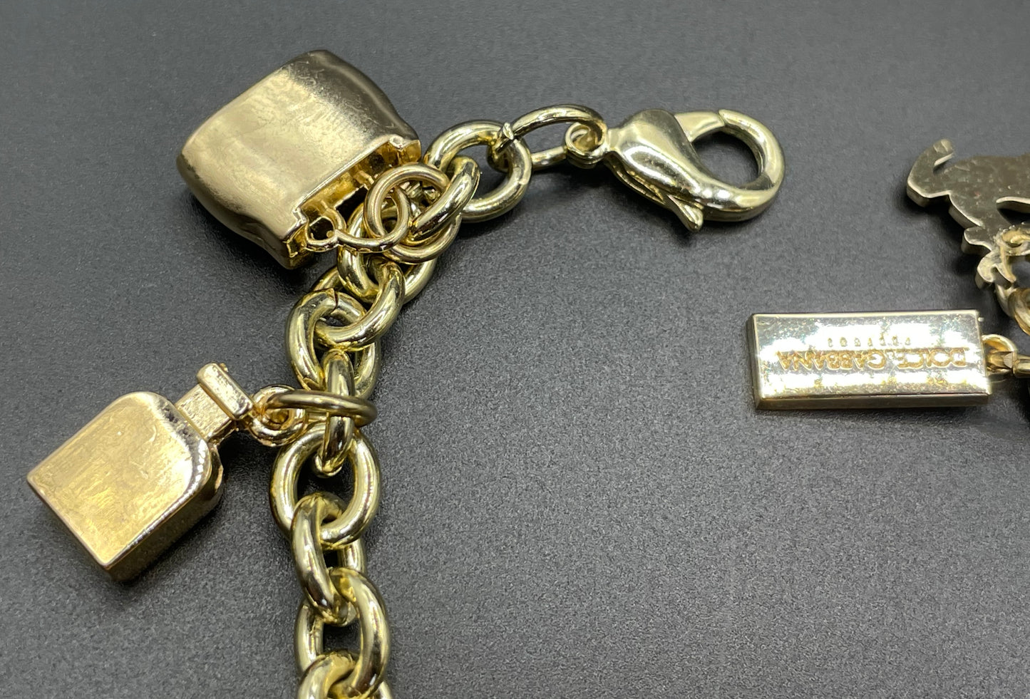 Vintage Dolce and Gabbana D&G heavy gold plated signed designer charm bracelet