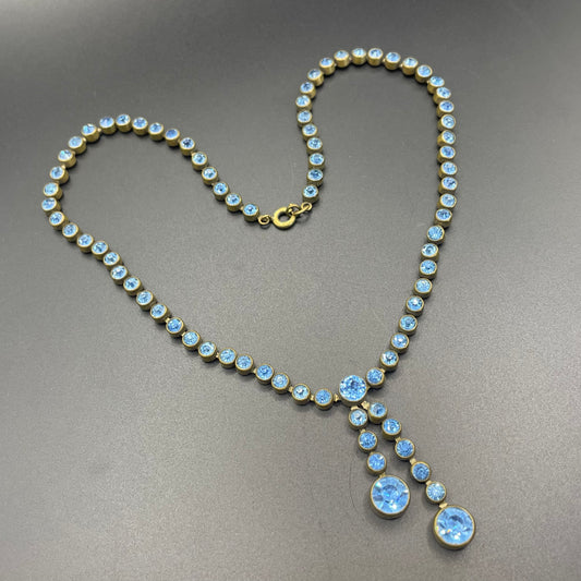 Vintage Art Deco sapphire blue paste riviere necklace with collet set rhinestones set in antique gold tone & asymmetric negligee strands