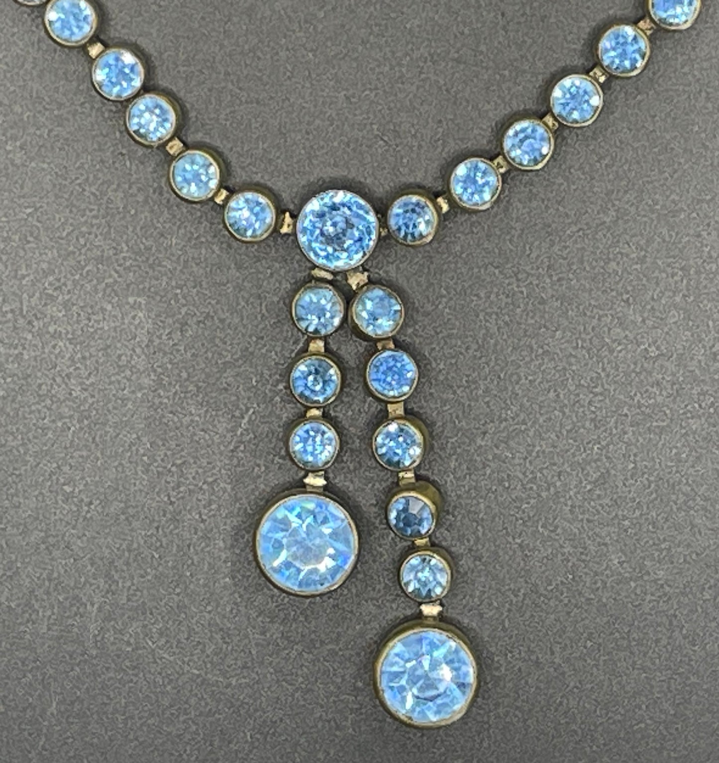 Vintage Art Deco sapphire blue paste riviere necklace with collet set rhinestones set in antique gold tone & asymmetric negligee strands