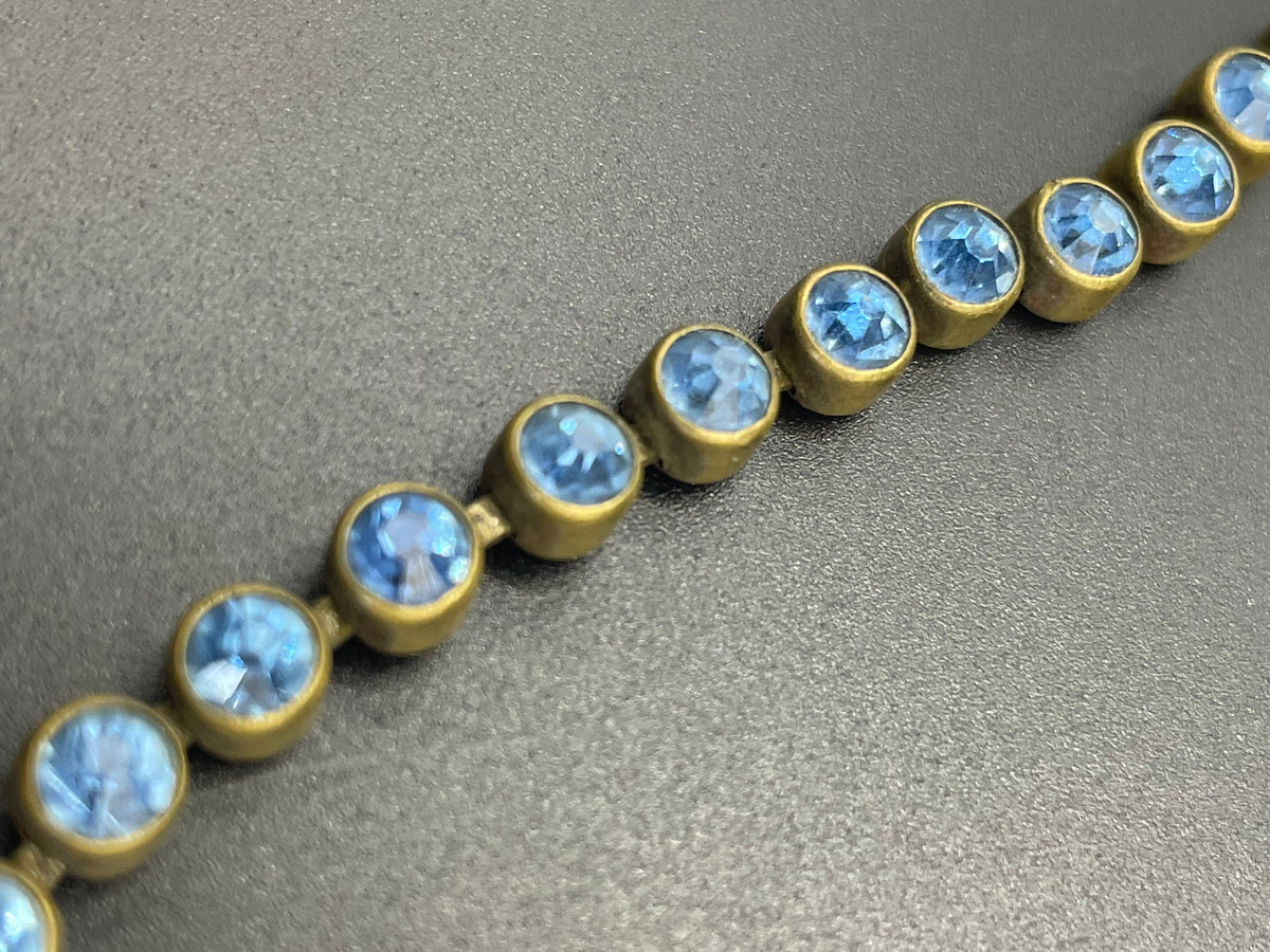 Vintage Art Deco sapphire blue paste riviere necklace with collet set rhinestones set in antique gold tone & asymmetric negligee strands