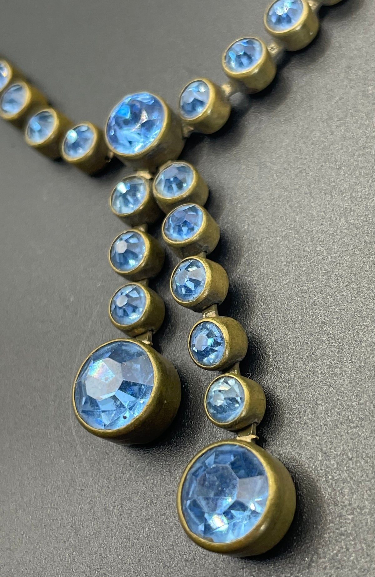 Vintage Art Deco sapphire blue paste riviere necklace with collet set rhinestones set in antique gold tone & asymmetric negligee strands