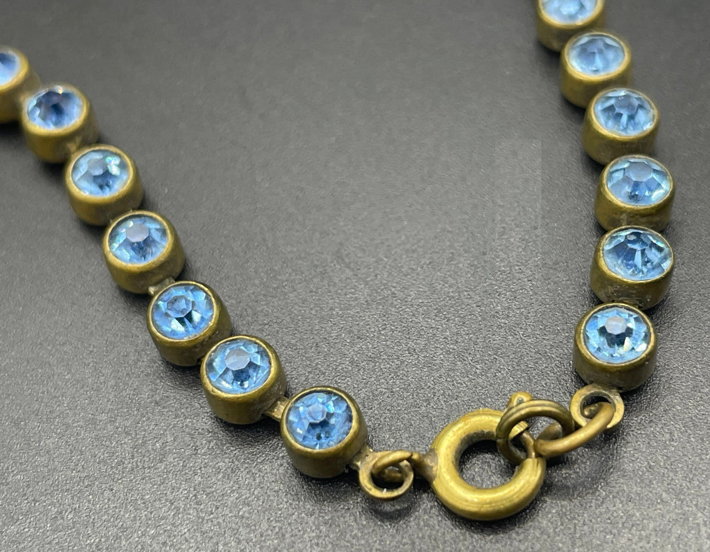 Vintage Art Deco sapphire blue paste riviere necklace with collet set rhinestones set in antique gold tone & asymmetric negligee strands