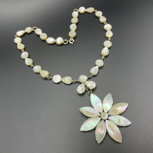 Antique / vintage mother of pearl riviere necklace, open backed pale gold tone settings, beautiful MOP cabochons, large floral pendant drop