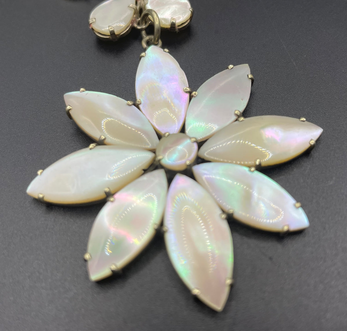 Antique / vintage mother of pearl riviere necklace, open backed pale gold tone settings, beautiful MOP cabochons, large floral pendant drop