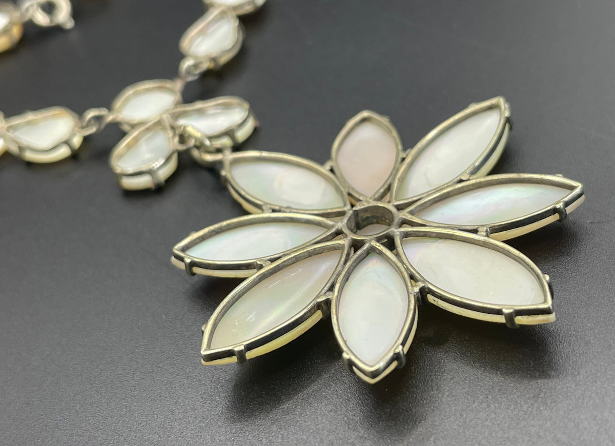 Antique / vintage mother of pearl riviere necklace, open backed pale gold tone settings, beautiful MOP cabochons, large floral pendant drop
