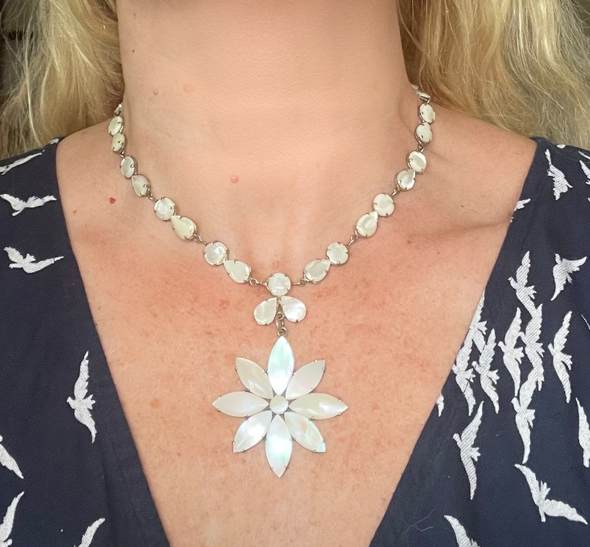 Antique / vintage mother of pearl riviere necklace, open backed pale gold tone settings, beautiful MOP cabochons, large floral pendant drop