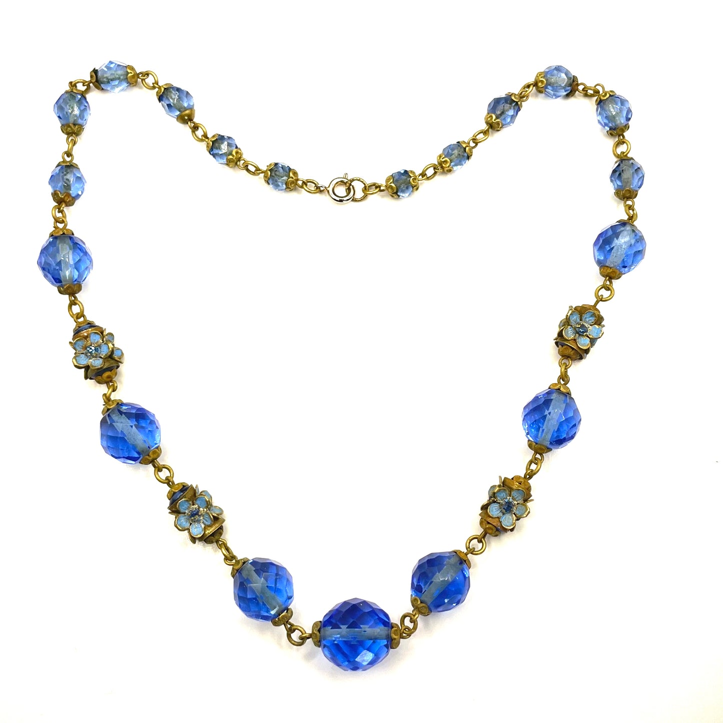 Vintage Art Deco faceted sapphire blue glass bead and rhinestone Czech necklace with beautiful gold tone and enamel painted floral features