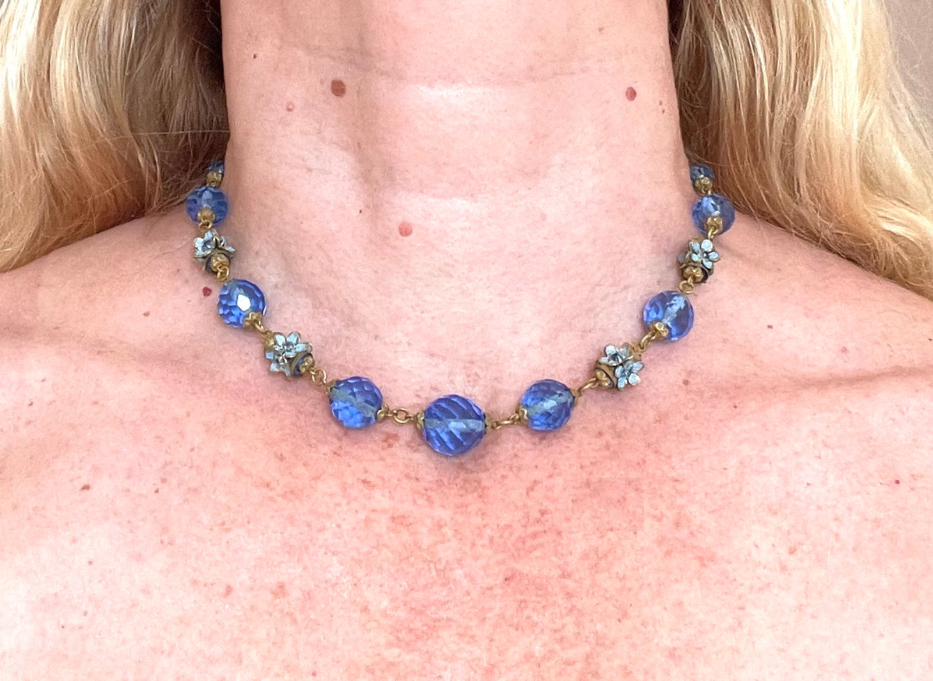 Vintage Art Deco faceted sapphire blue glass bead and rhinestone Czech necklace with beautiful gold tone and enamel painted floral features