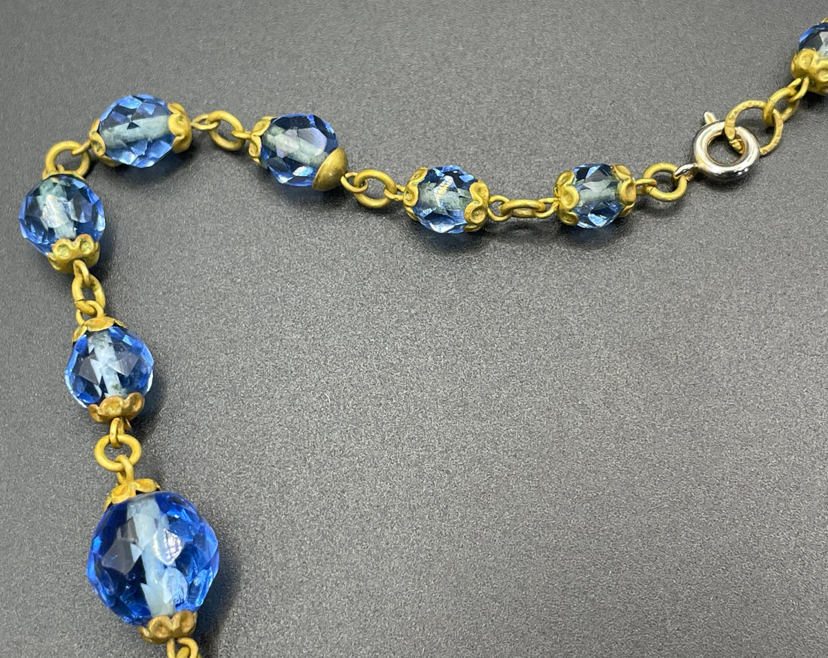 Vintage Art Deco faceted sapphire blue glass bead and rhinestone Czech necklace with beautiful gold tone and enamel painted floral features