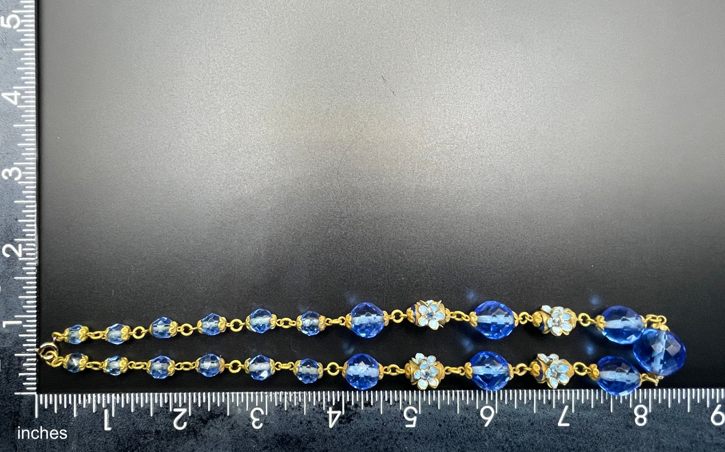 Vintage Art Deco faceted sapphire blue glass bead and rhinestone Czech necklace with beautiful gold tone and enamel painted floral features