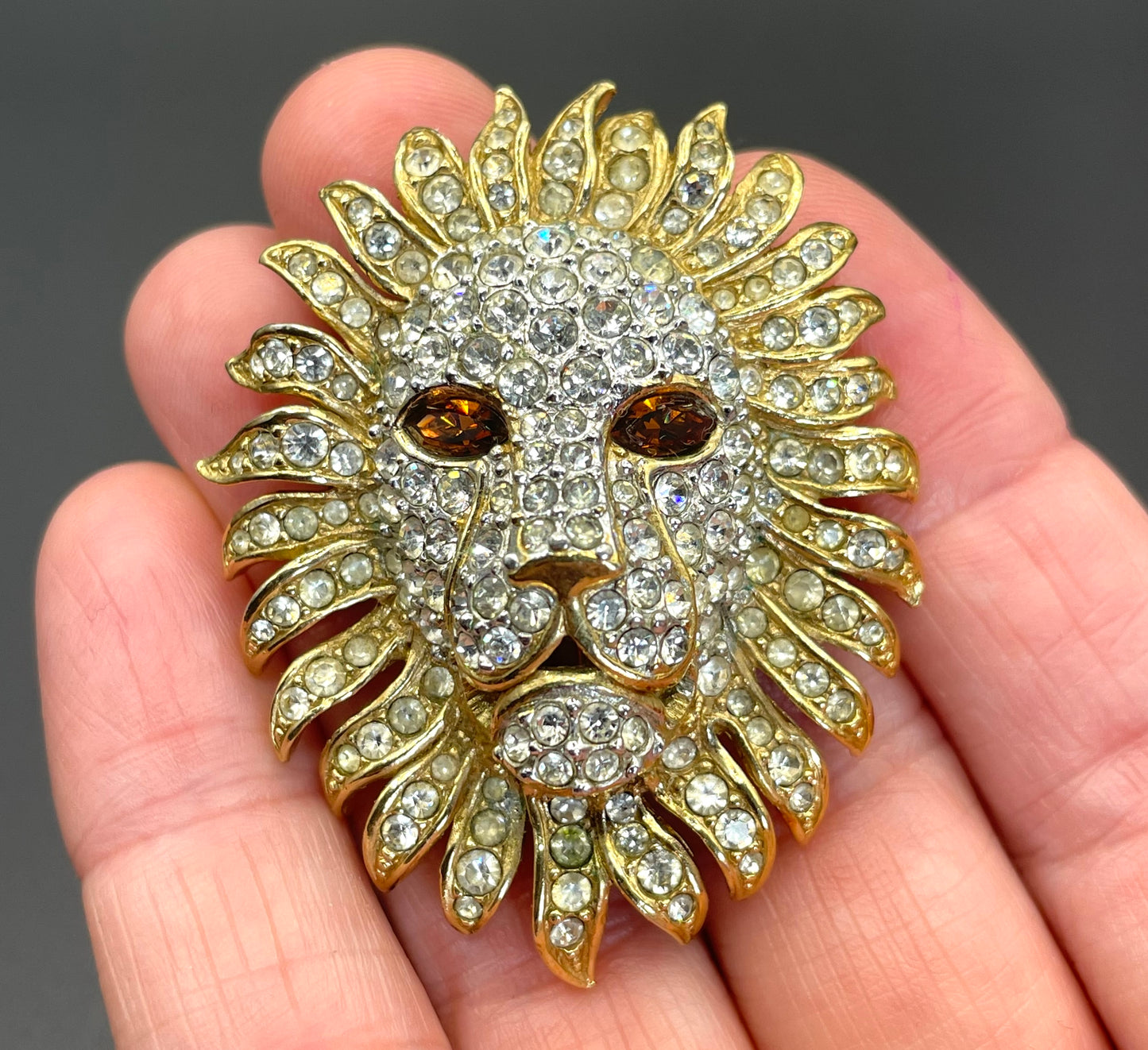 Vintage Attwood and Sawyer (A&S) large clear rhinestone lion brooch - signed, 22ct gold plated, citrine / topaz orange rhinestone eyes