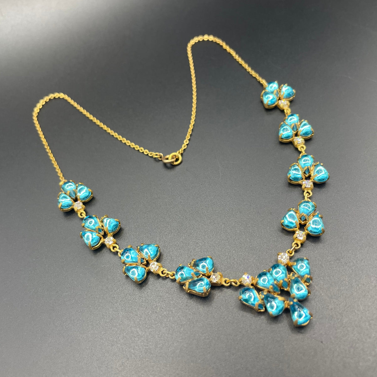 Vintage aqua blue glass cabochon, clear rhinestone and gold tone Y-shaped necklace, beautiful piece