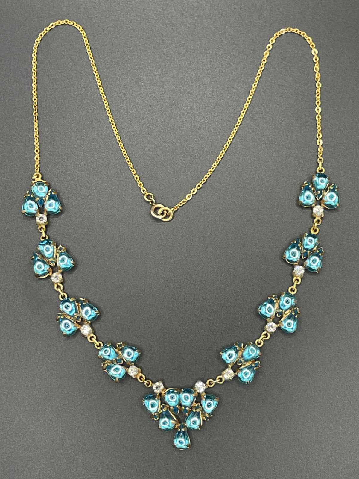 Vintage aqua blue glass cabochon, clear rhinestone and gold tone Y-shaped necklace, beautiful piece