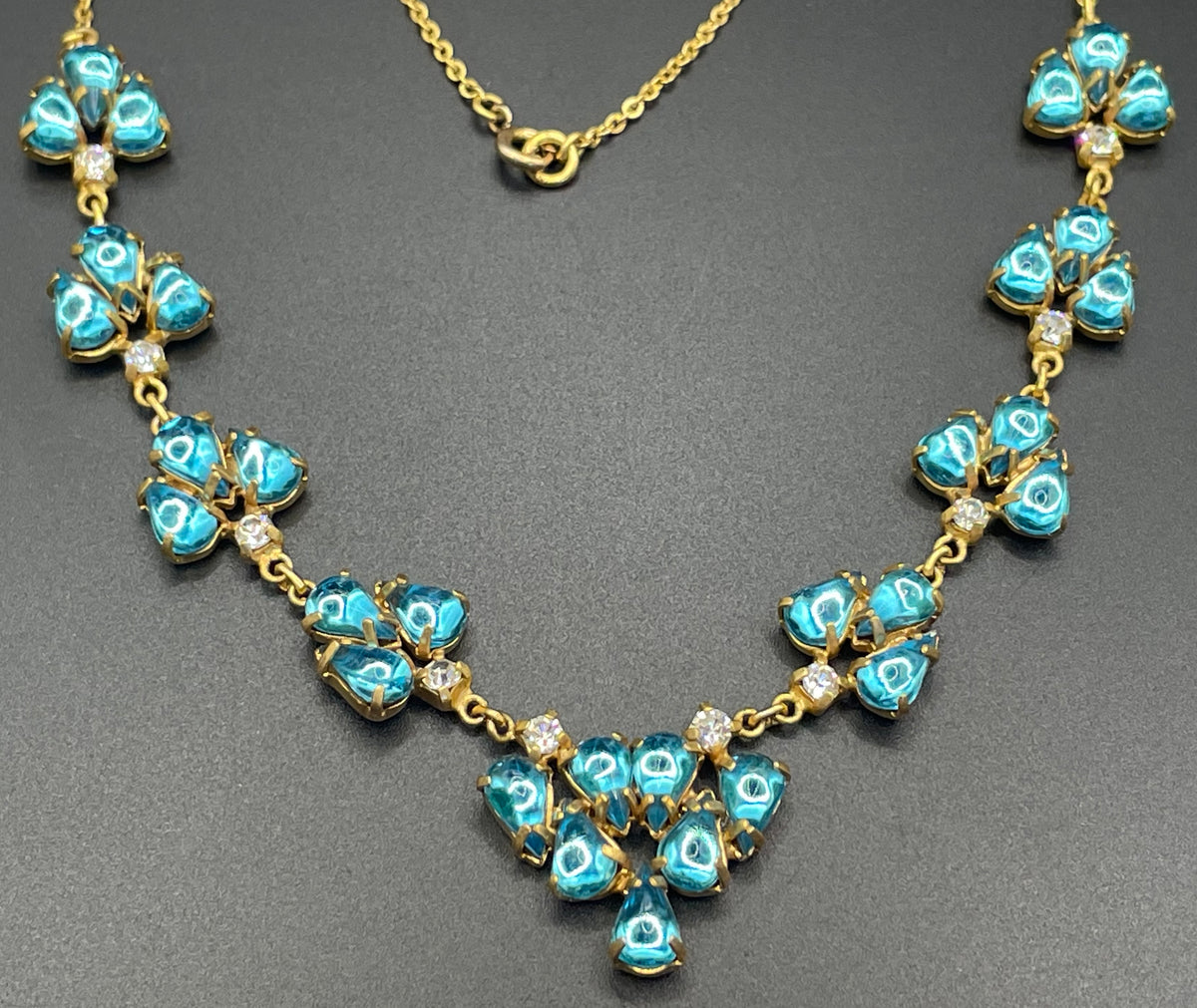 Vintage aqua blue glass cabochon, clear rhinestone and gold tone Y-shaped necklace, beautiful piece