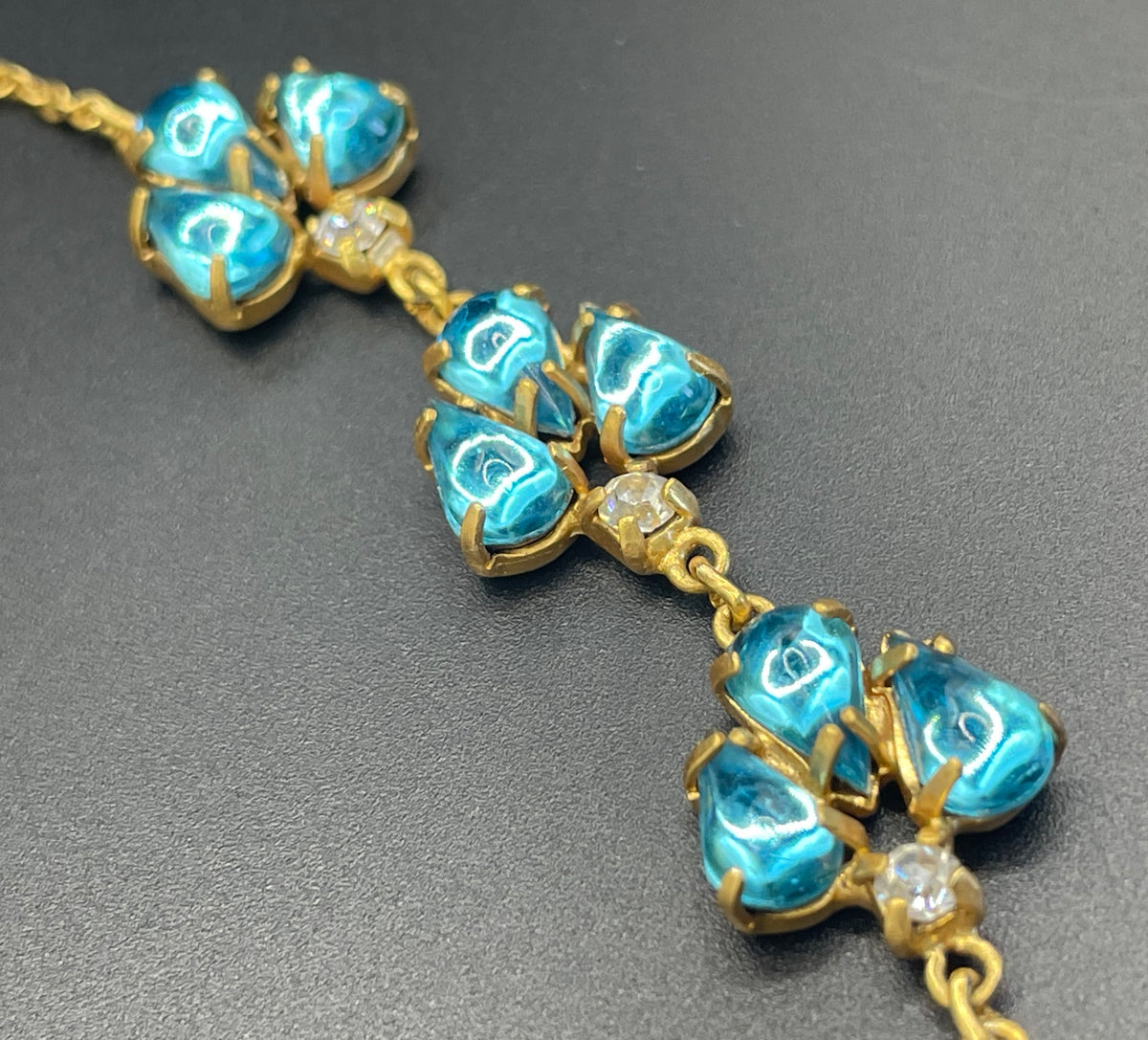 Vintage aqua blue glass cabochon, clear rhinestone and gold tone Y-shaped necklace, beautiful piece