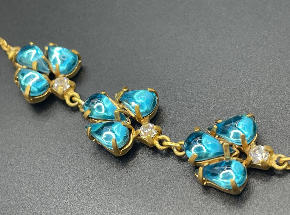 Vintage aqua blue glass cabochon, clear rhinestone and gold tone Y-shaped necklace, beautiful piece