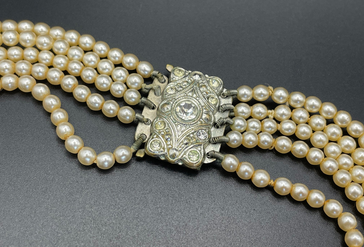 Vintage five strand glass faux pearl necklace with ornate clear rhinestone box clasp, graduated glass pearls
