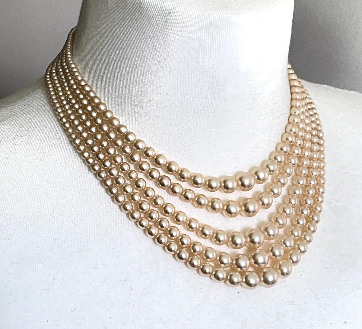 Vintage five strand glass faux pearl necklace with ornate clear rhinestone box clasp, graduated glass pearls