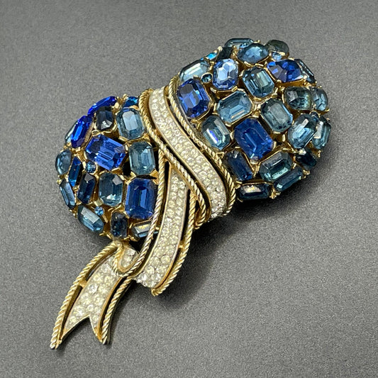 Vintage signed Trifari blue and clear rhinestone brooch in gold tone, a heavy, good quality example