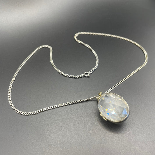Antique faceted rock crystal locket pendant in unmarked silver, paired with a more modern 18-inch sterling silver chunky curb chain