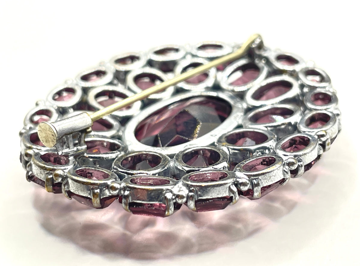 Large vintage Art Deco amethyst purple glass rhinestone, open-backed paste brooch pin in silver tone, stunning vibrant colour